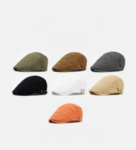 Collection of seven distressed cotton newsboy caps in various colors with side metal buckles