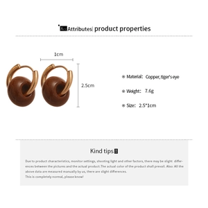 Detail view of tiger's eye bead earrings with copper finish and exact dimensions
