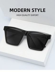 Detail of modern black square sunglasses on a minimalist white display stand