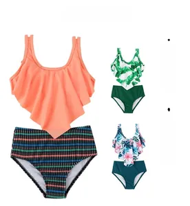Three sets of girls' two-piece bikinis featuring ruffles and floral striped prints