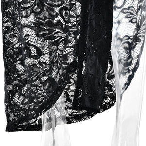 Detailed close-up of intricate black floral lace pattern and sheer fabric texture