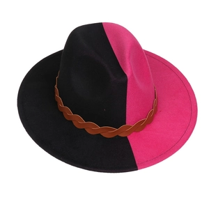 Detail of two-tone black and fuchsia wool felt fedora with a brown braided band