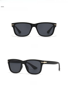 Front and 45-degree side view of black and gold round frame fashion sunglasses