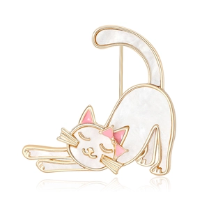 Cute white enamel cat brooch in gold alloy finish with pink bow and stretching pose