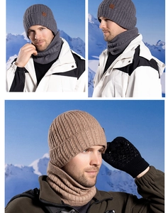 Detail of cable knit pattern and leather tag on winter beanie and scarf set