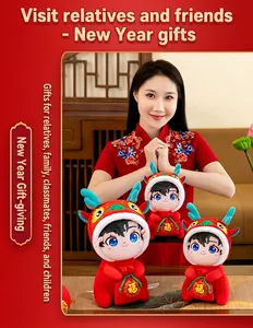 Asian woman presenting Chinese New Year dragon plush dolls in festive red color