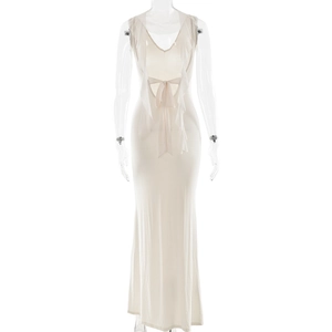 Detail of elegant backless evening maxi dress with large ruffle bow and V-neckline