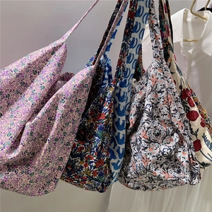 Close-up of five floral patterns for cotton tote bags including vintage and pastoral designs