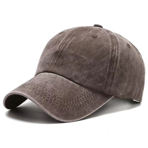Detail of washed cotton baseball cap with vintage worn-out texture and 45-degree profile view