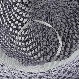 Detail of purple woven hat interior featuring breathable mesh and adjustable sweatband