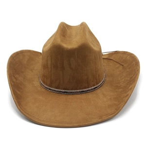 Detailed view of brown suede cowboy hat featuring rhinestone snake pattern band