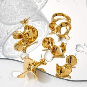 Golden 316 stainless steel jewelry set featuring irregular geometric ring and earrings