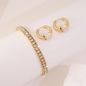 Gold plated bracelet and hoop earrings set with sparkling white cubic zirconia crystals