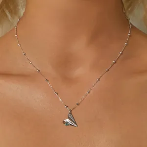 S925 sterling silver paper plane necklace with bead chain on model neck display