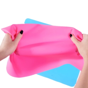 Flexible and durable silicone mat for DIY crafts and baking shown in a high-stretch test