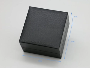 Detailed view of a black faux leather watch gift box with dimensions 10x10x6cm