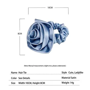 Blue satin rose hair scrunchie with floral vintage design and elegant silk texture finish