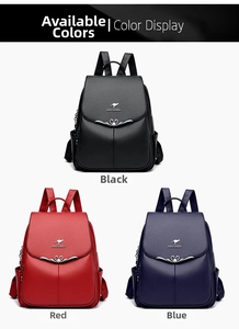 Three leather backpacks in black, red, and blue with heart metal buckles and flap design
