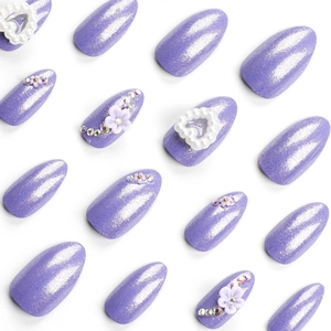 Lilac almond press-on nails with silver glitter, pearl hearts and white floral 3D charms
