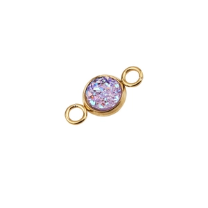 Detail of 6mm gold-plated stainless steel connector with purple sparkling stone inlay