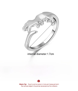 Detailed view of silver dinosaur open ring made of copper with size and weight specs