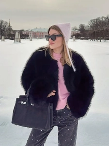 Faux fur coat in black with soft collar and wide cuffs for autumn winter fashion style