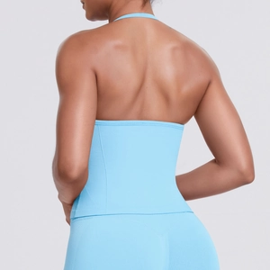 Detail view of the open-back design on light blue high-impact sports bra for yoga