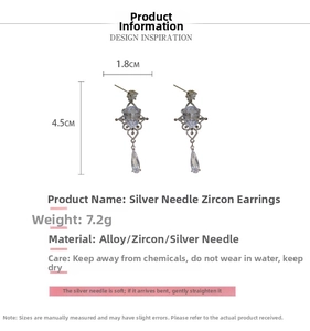 Detail view of teardrop zircon earrings showing 4.5cm length and 1.8cm width dimensions