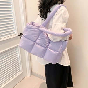 Minimalist purple quilted tote bag with square pattern and soft down-filled texture