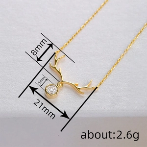 Elegant gold reindeer antler necklace with sparkling zircon stone pendant for women