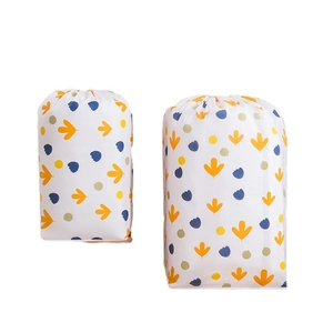 Waterproof PEVA drawstring storage bag for quilts featuring navy and yellow leaf patterns