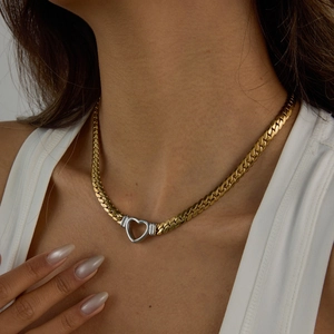 Luxurious 18K gold plated chunky Cuban chain necklace with a silver hollow heart pendant