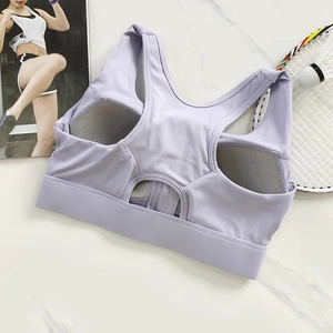 Detail of lavender racerback sports bra showing breathable mesh lining and cutout back