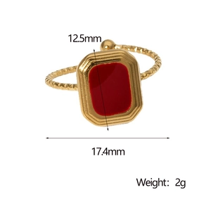 Detail shot of golden square ring with red enamel inlay showing 12.5mm x 17.4mm dimensions