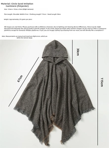Flat lay of a grey hooded poncho wrap with fringed edges and dimensional measurements