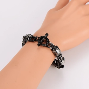 Punk style dark metal skull bracelet for men with cool OT buckle worn on wrist