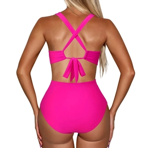 Detailed back view of a hot pink bikini set with cross halter neck and elegant back bow tie