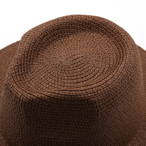 Deep brown straw Panama hat featuring exquisite spiral woven craftsmanship for sun protection