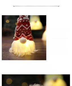 Close-up of glowing Christmas gnome with red snowflake hat and warm light fiber beard