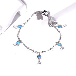 Detailed close-up of S925 sterling silver stamp on butterfly bracelet with blue zircons