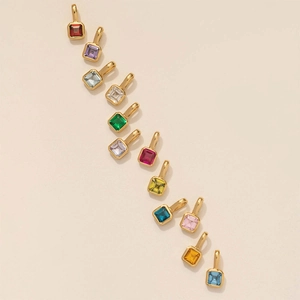 Colorful square birthstone charms with gold bezel setting in multiple vibrant colors