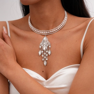 Elegant multi-layer choker necklace featuring faux pearls and sparkling rhinestone tassels