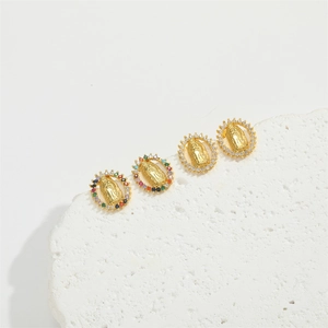 Gold plated brass Our Lady of Guadalupe pendants with cubic zirconia on white stone