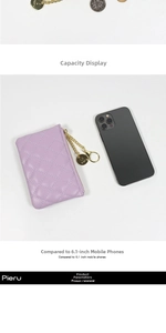 Compact purple quilted coin purse with gold zipper shown next to a 6.1-inch smartphone