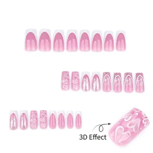 Pink French gradient press-on nails with 3D heart relief and silver glitter coffin shape