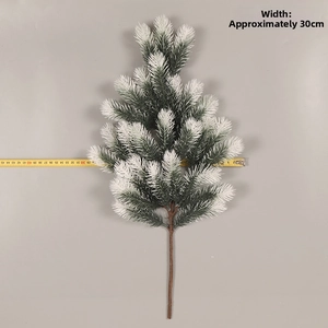 Detail view of 30cm artificial frosted pine branch with heavy snow flocking for Christmas