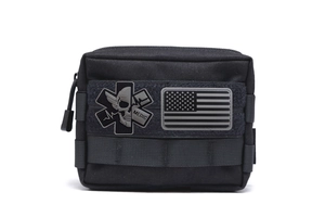 Black tactical medic pouch with MEDIC skull patch and US flag on nylon fabric