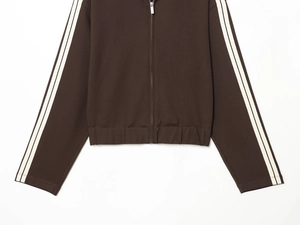 Detail of dark brown retro sports jacket with white side stripes and zipper closure