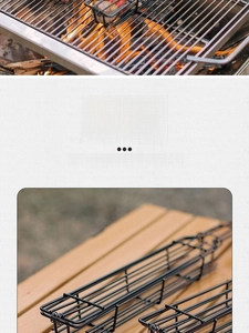 Close-up of a black coated metal BBQ grill basket with a durable wooden handle on a table