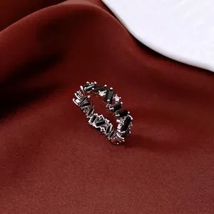 Vintage irregular ring with emerald cut black zircon and sparkling crystal accents